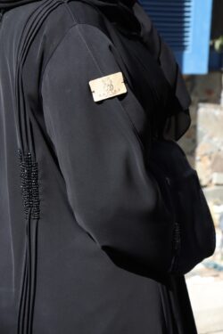 عباية كلوش نواعم بشك على الأكمام و الأجناب بشكل مميز