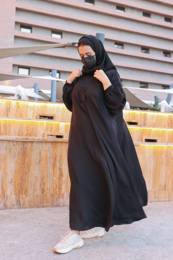 ⁦عباية مقفل بلاك بيري بكسرة كلوش بجيوب امامى واكمام مطاط مميزه⁩ - الصورة ⁦5⁩