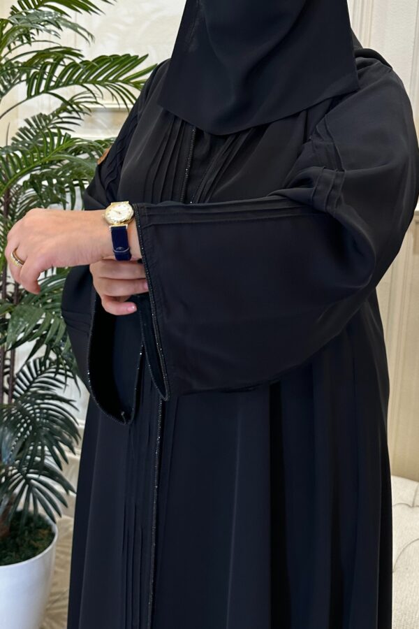 ⁦عباية كلوش بدقات زي وشريط فصوص محدد من الاكمام و الامام⁩ - الصورة ⁦6⁩