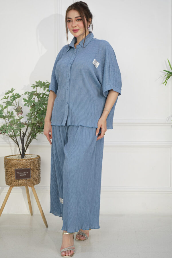 ⁦طقم كاجوال سماوي تتكون من قطعتين بأكمام قصيرة وبنطلون طويل⁩ - الصورة ⁦4⁩