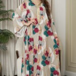 جلابيه بيج حرير مورده و شريط ذهبي من امام