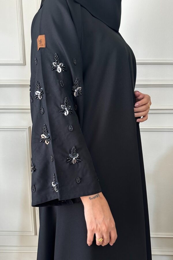 ⁦عبايه لينا كلوش بشك ورود على اكمام⁩ - الصورة ⁦9⁩