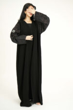 ⁦عباية بدقات بكم مفصول مشجره بالأسود و نحاسي⁩ - الصورة ⁦6⁩