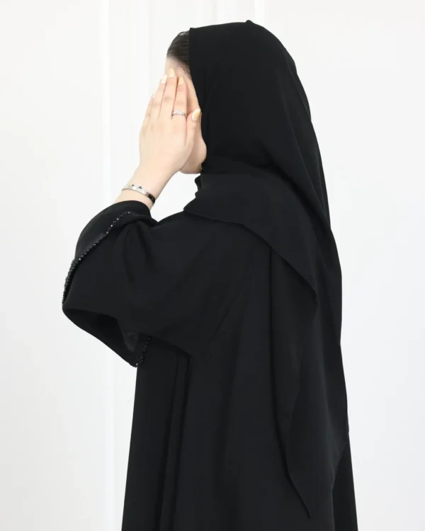 ⁦عباية كلوش بشك اسود محددة⁩ - الصورة ⁦11⁩